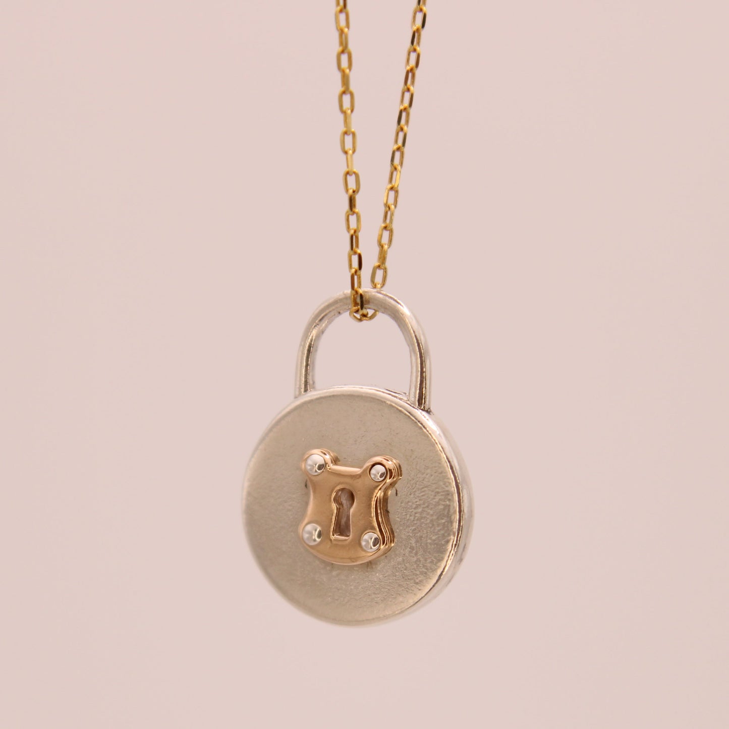 Tiffany & Co Sterling Silver 18kt Rose Gold Mini Round Vintage Lock Charm