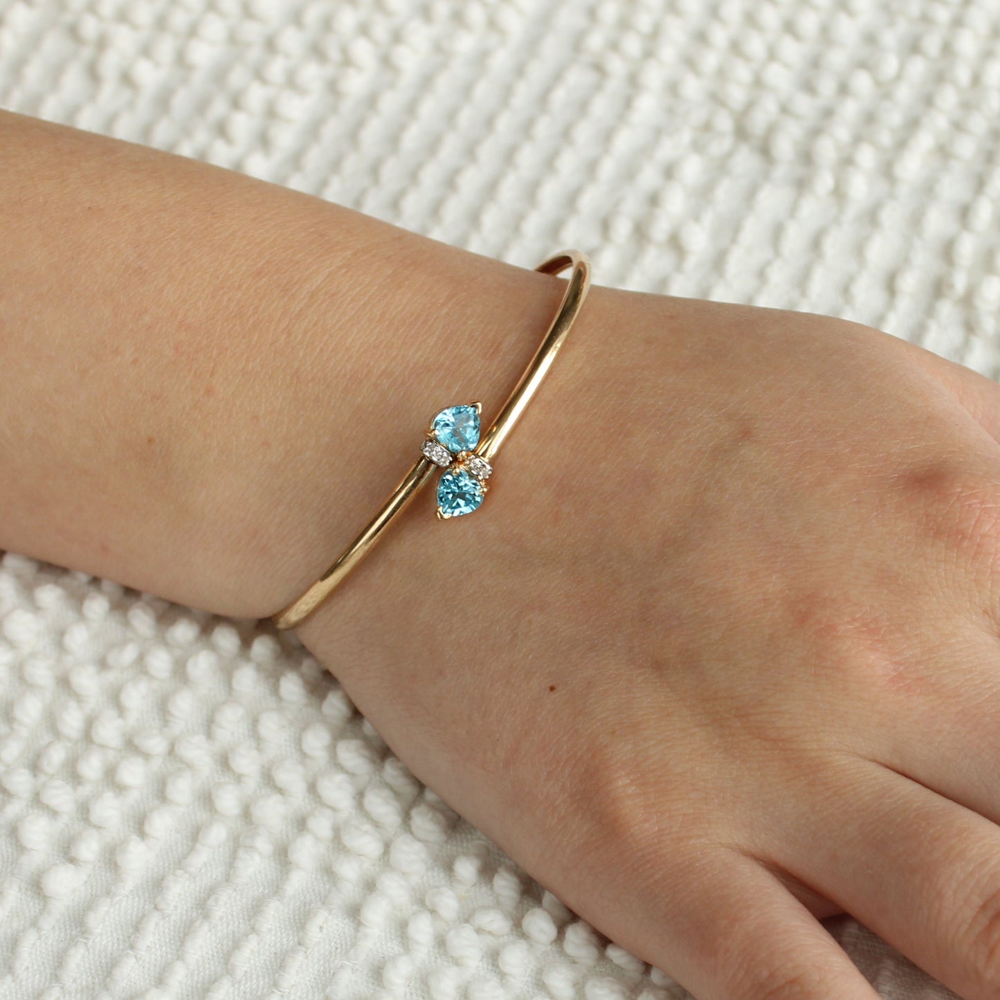 10kt Yellow Gold Blue Topaz Heart Cut Diamond Accent Bypass Bracelet