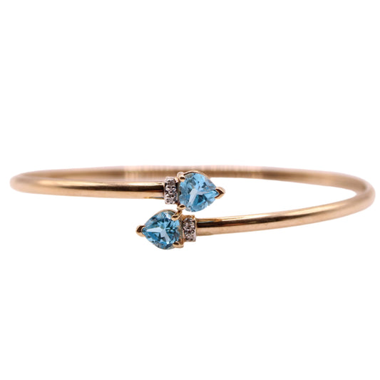 10kt Yellow Gold Blue Topaz Heart Cut Diamond Accent Bypass Bracelet