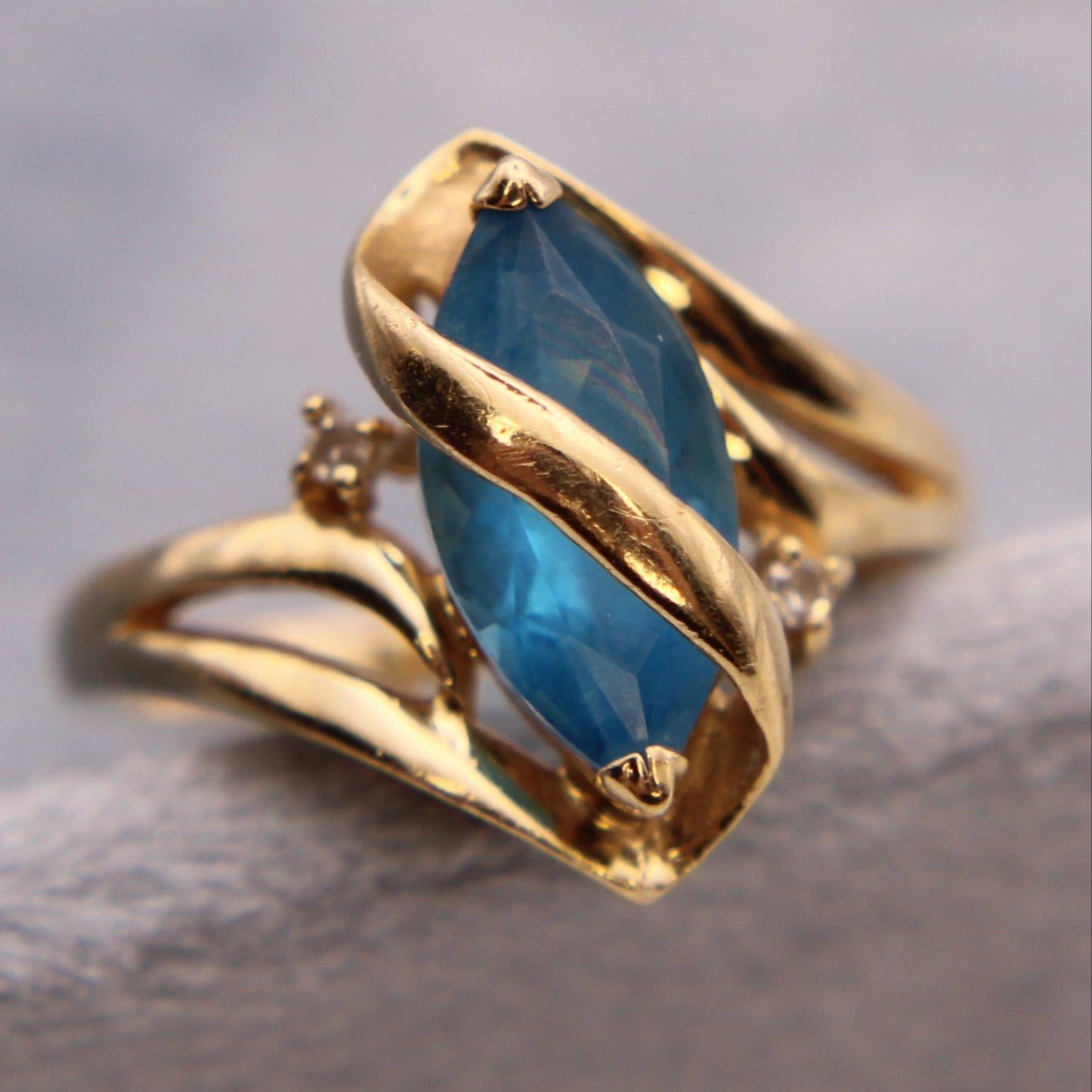 14kt Yellow Gold Diamond Blue Topaz Marquise Ribbon Wrap Cocktail Ring